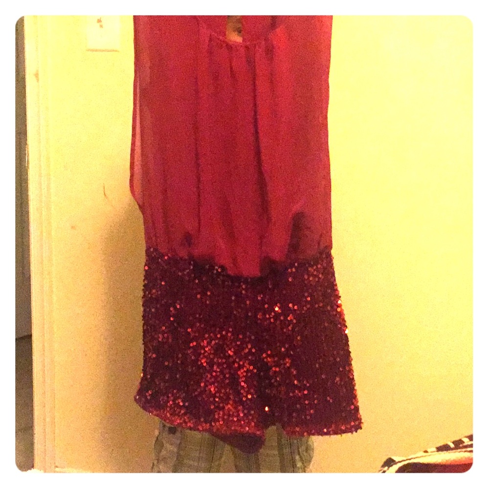 A sexy red romper short set with beautiful sequins